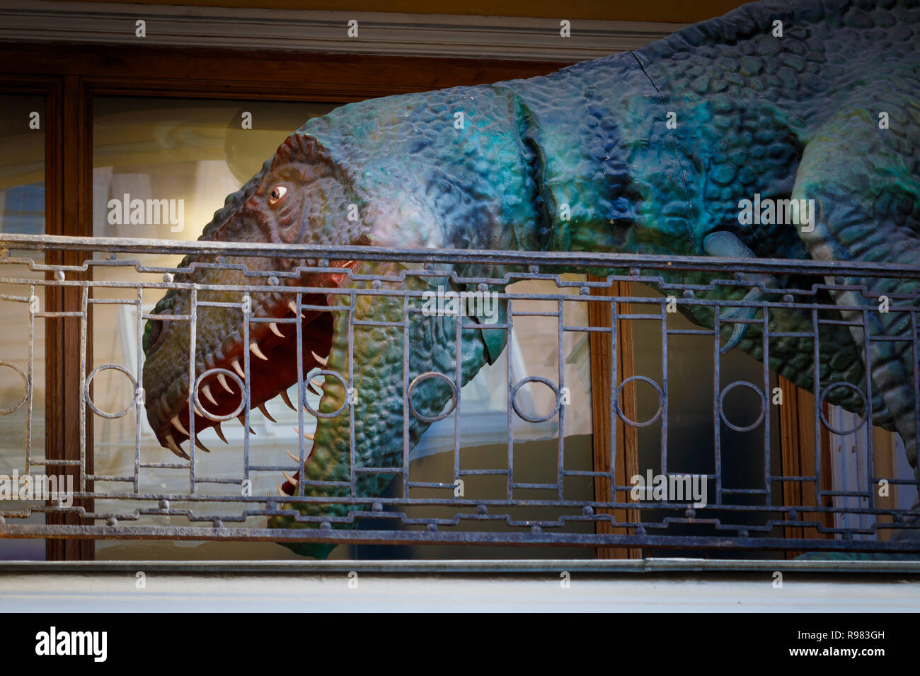 Movie Tyranosaurus Rex model dinosaur on display along a department store balcony. St Petersburg, Russia. Stock Photo