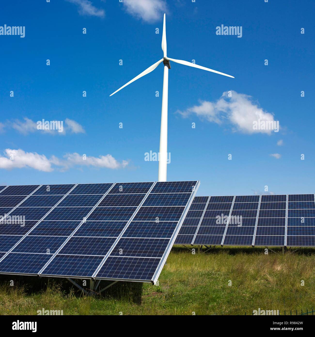 Renewable energy concept with view of a wind turbine and solar panels Stock Photo Alamy