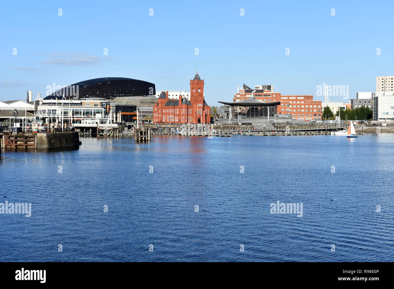 View across Cardiff Bay towards the Pierhead building, Cardiff Bay, Wales Stock Photo