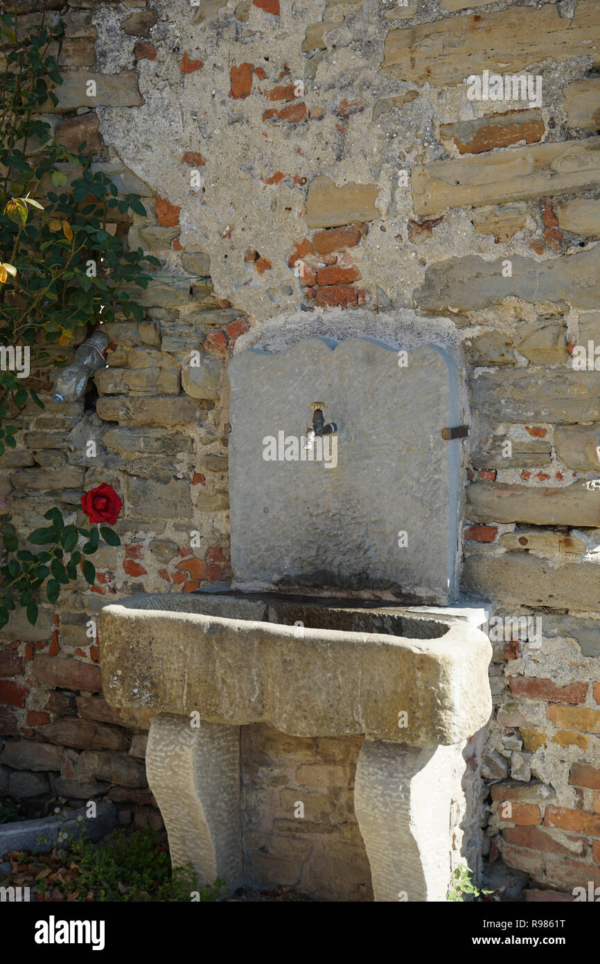 A stone fountain at Murazzano, Piedmont - Italy Stock Photo