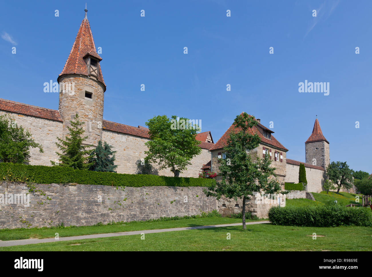 Red tiled towers in the western part of the medieval city ring wall around Rothenburg ob der Tauber, Franconia, Bavaria, Germany. Stock Photo