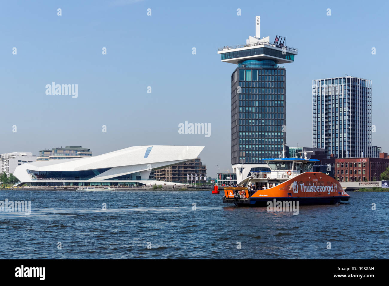 Waterfront of Amsterdam Noord district with modern building of EYE Film Institute Netherlands, Amsterdam, Netherlands Stock Photo