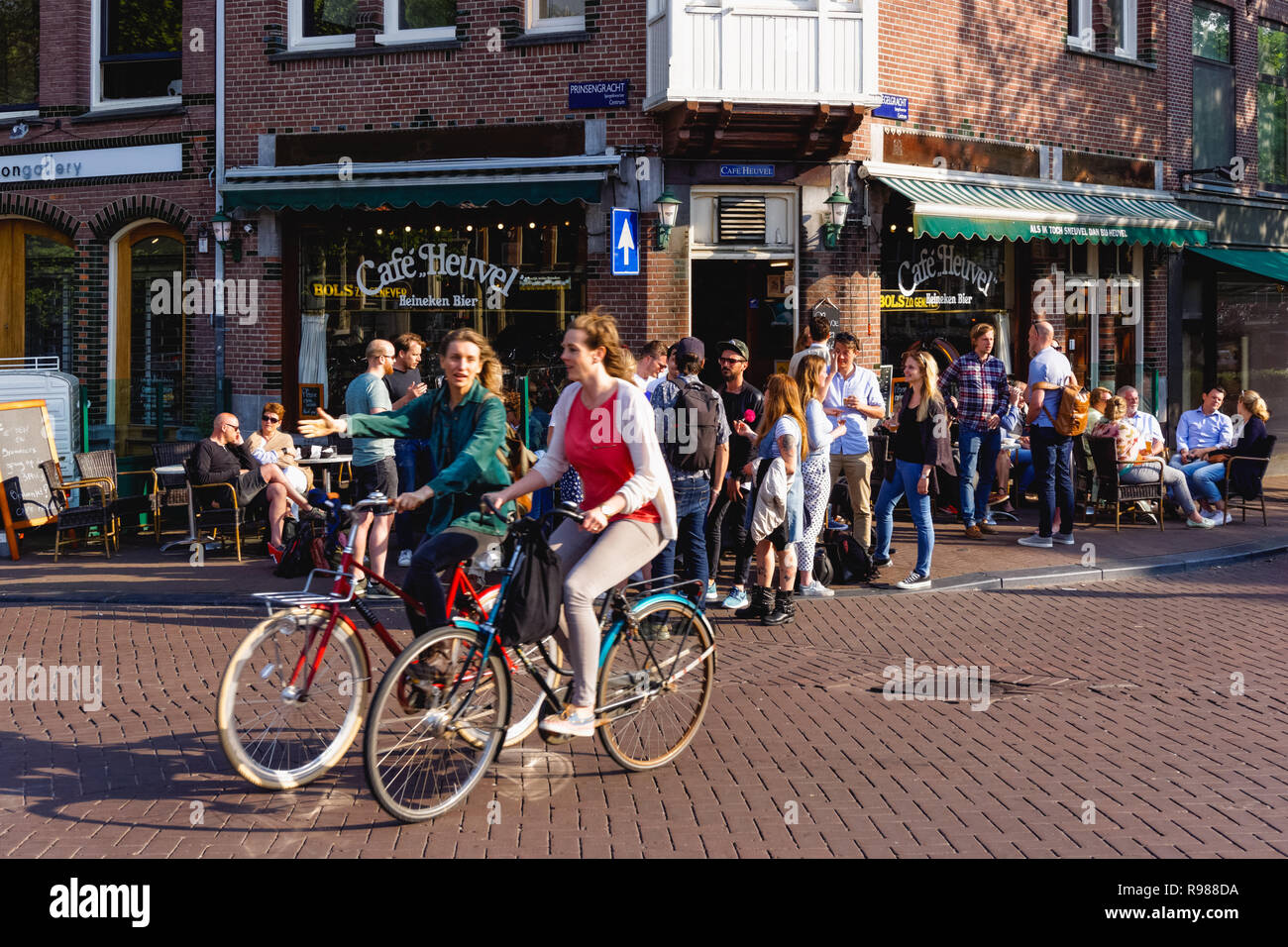 Young people enjoy summer weather in Amsterdam, Netherlands Stock Photo