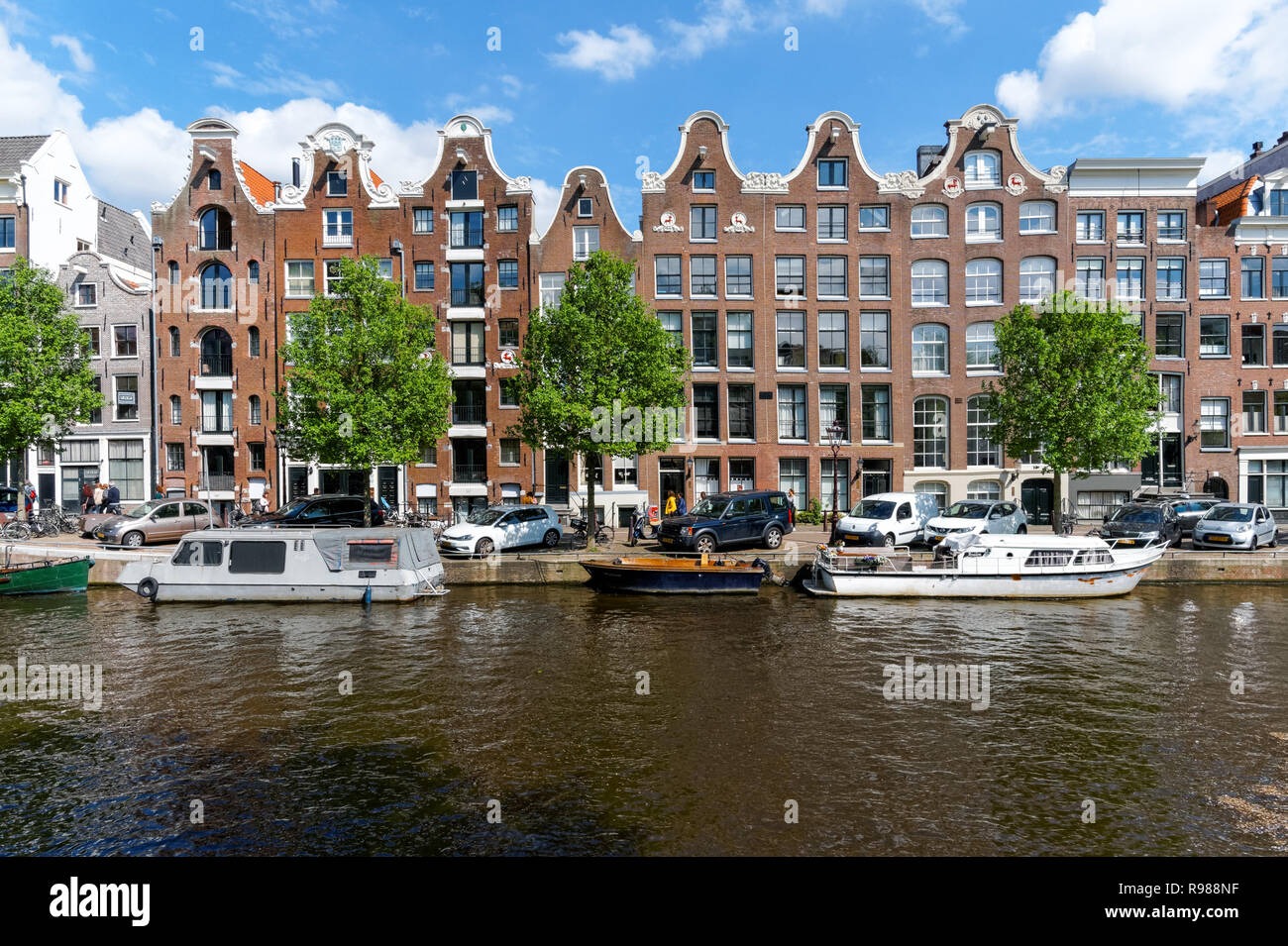 Traditional Dutch houses at Prinsengracht canal in Amsterdam, Netherlands Stock Photo