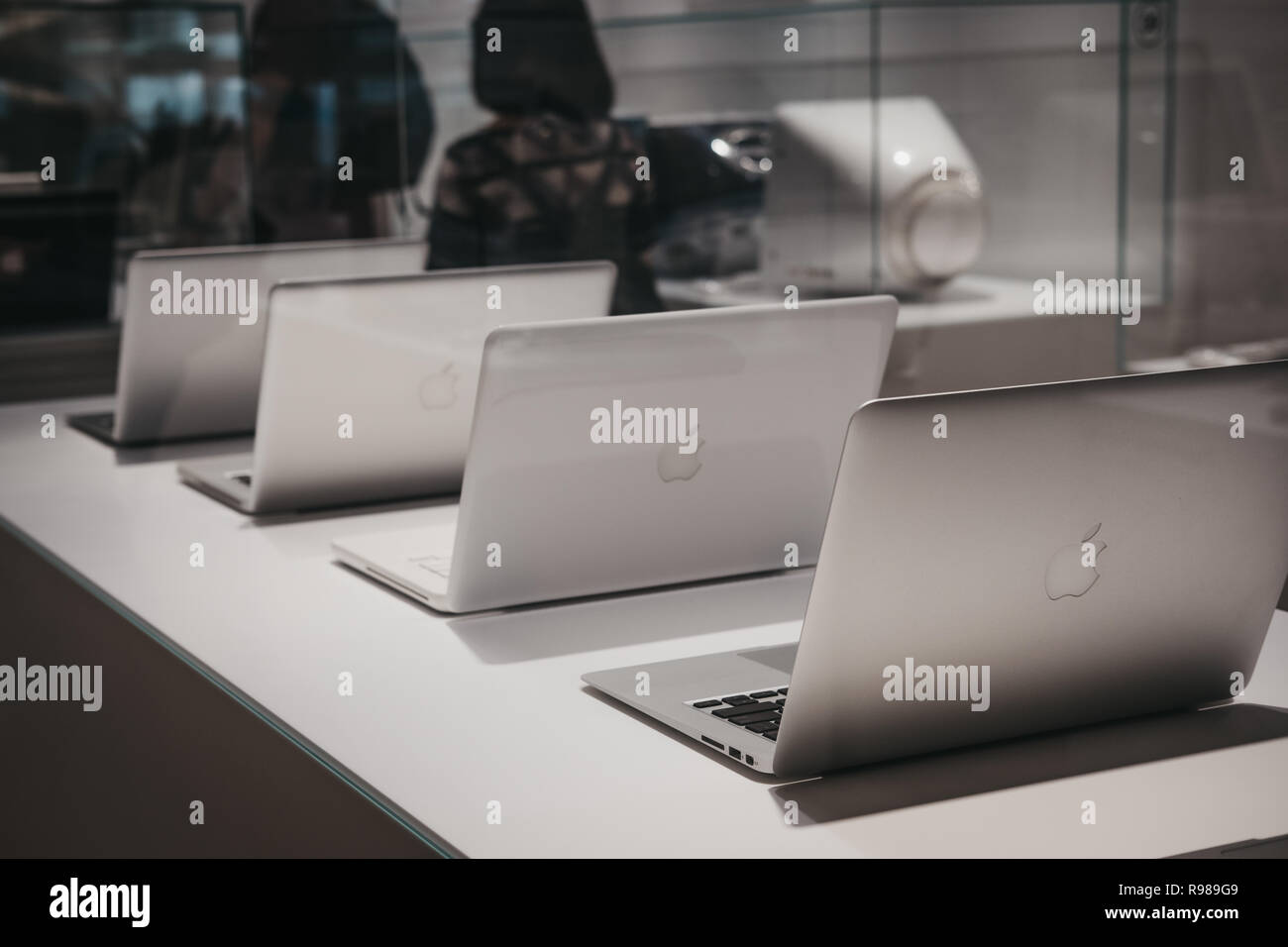 Prague, Czech Republic - August 28, 2018: Range of MacBooks on display inside Apple Museum in Prague, the largest private collection of Apple products Stock Photo