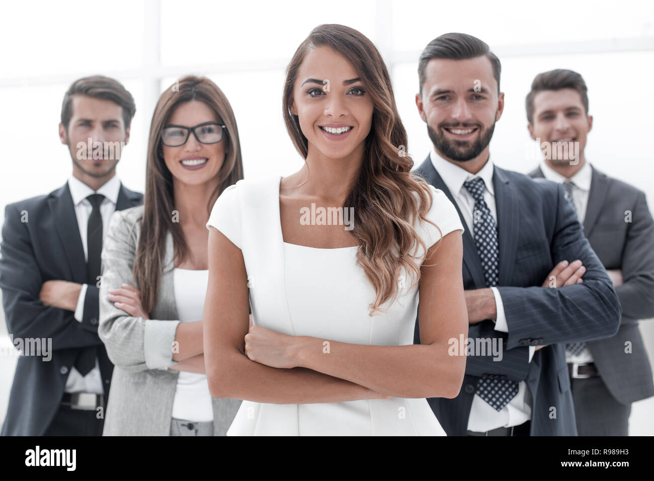 young business woman in front of the business team Stock Photo - Alamy