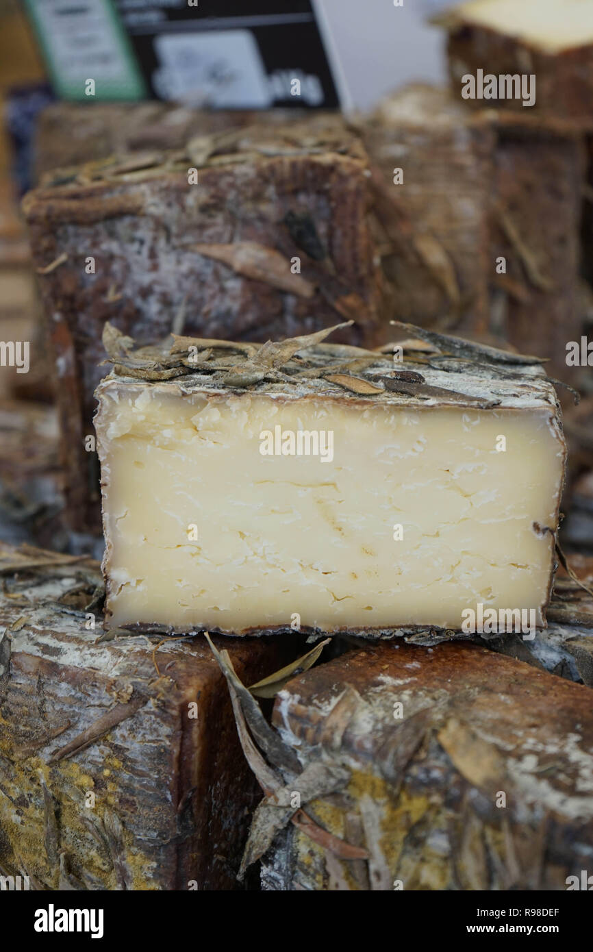 Forms of artisan cheese Stock Photo