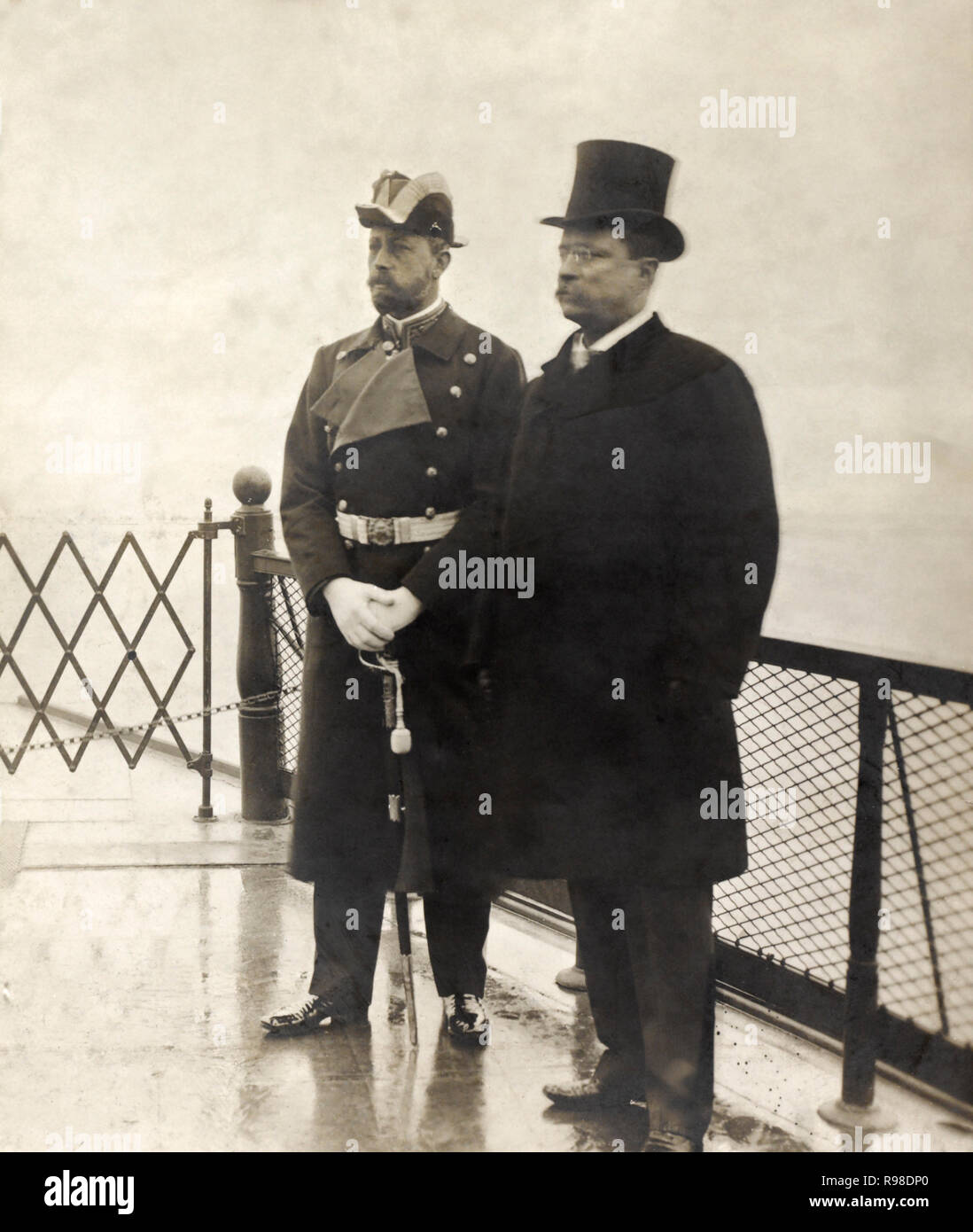 U.S. President Theodore Roosevelt with Prince Henry of Prussia on Deck of Kaiser Wilhelm III's Imperial Yacht, Meteor III, during Yacht's Christening Ceremony, Shooters Island, New York, USA, by George Grantham Bain, February 1902 Stock Photo