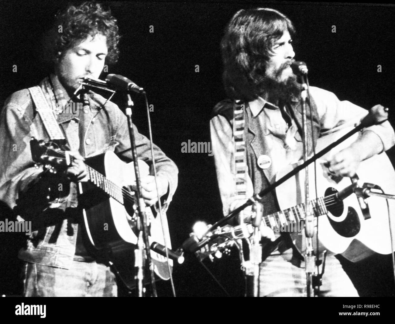 Bob Dylan & George Harrison performing at the concert for Bangladesh, 1971. Stock Photo