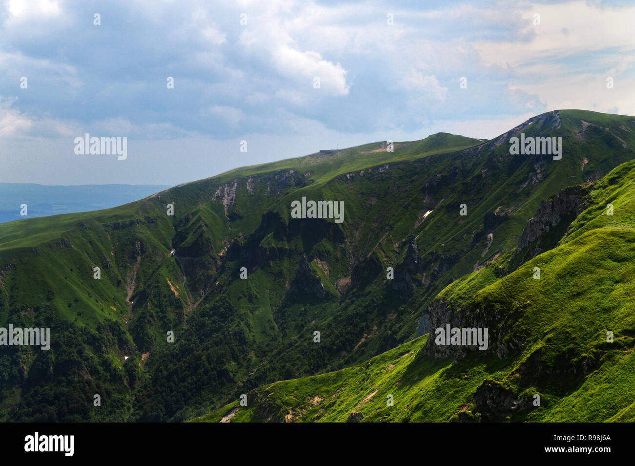 A magnificent panorama from the mountain range of Sancy, in Auvergne, France. National Park of the Auvergne volcano Stock Photo