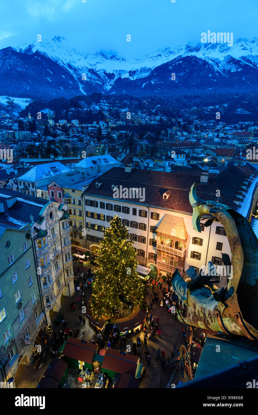 Innsbruck: Christmas Market and tree, house Goldenes Dachl (Golden Roof), street Herzog-Friedrich-Straße, mountain Nordkette, view from Stadtturm (cit Stock Photo