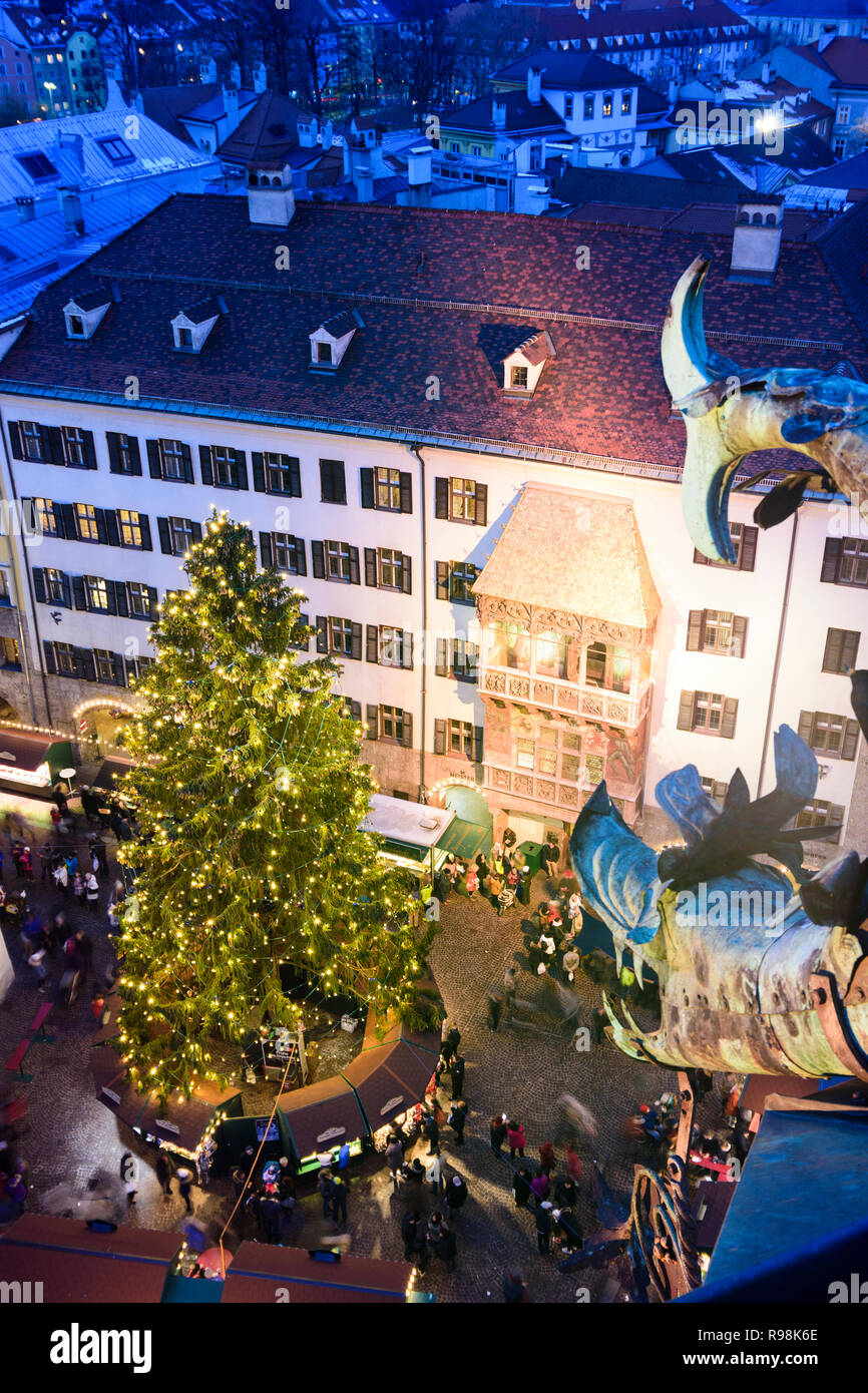 Innsbruck: Christmas Market and tree, house Goldenes Dachl (Golden Roof), street Herzog-Friedrich-Straße, view from Stadtturm (city tower) of Altes Ra Stock Photo