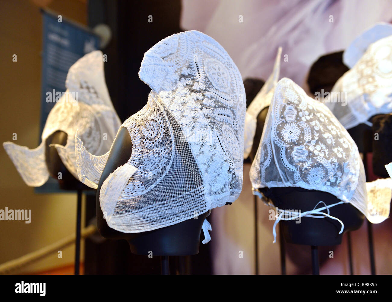 Display of traditional lace caps in the Zuiderzee Museum, Enkhuizen, Holland, Netherlands Stock Photo