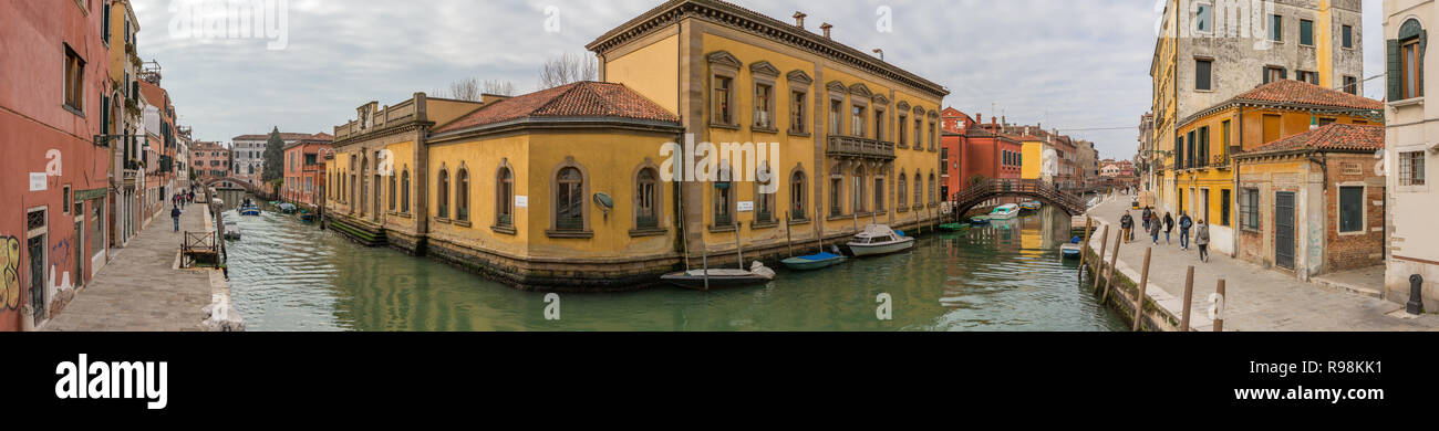 Venice, Italy - March 23, 2018: Panorama view of the side canal in Venice, Italy Stock Photo