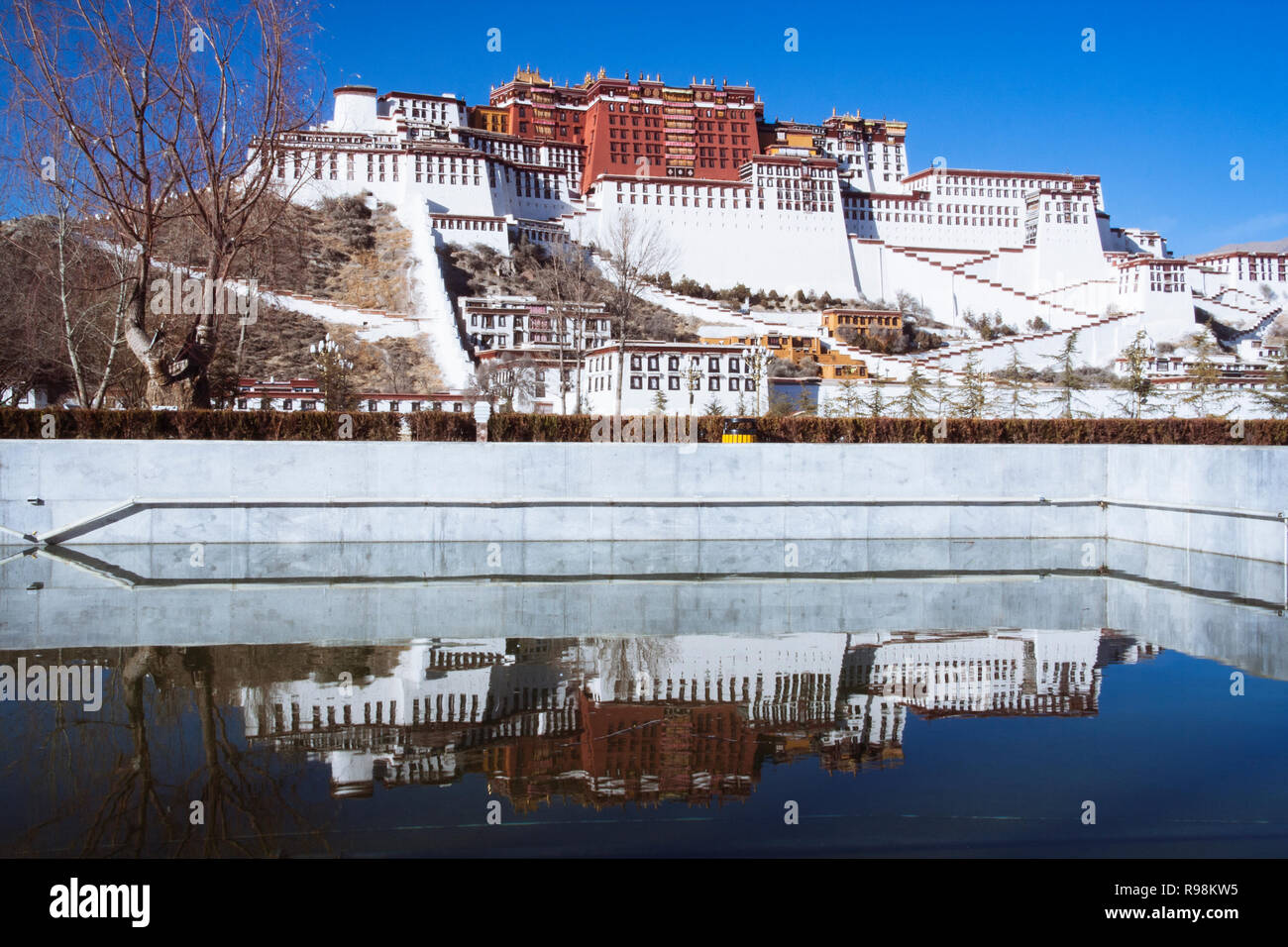 Lhasa, Tibet Autonomous Region, China : Potala palace reflected on a pool. First built in 1645 by the 5th Dalai Lama, the Potala was the residence of  Stock Photo