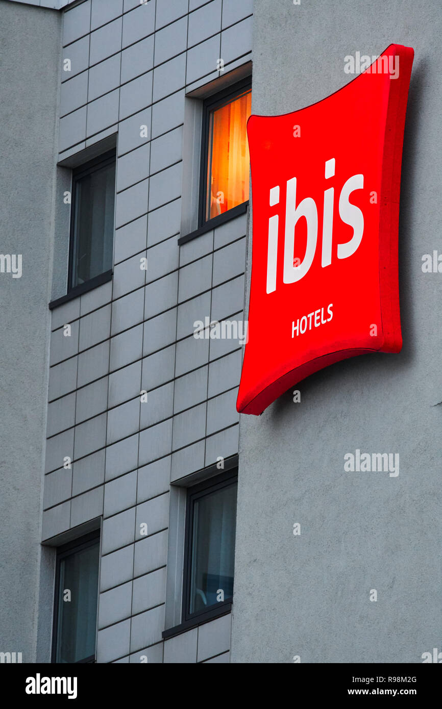 Illuminated sign on a wall of the Ibis budget hotel at Birmingham airport, England. Stock Photo