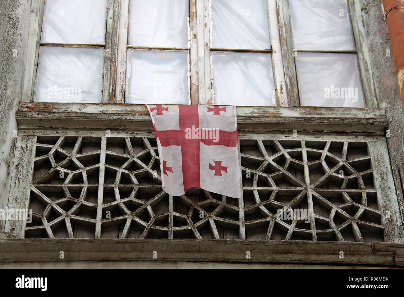 Georgian Five Cross Flag on a building in Tbilisi Stock Photo