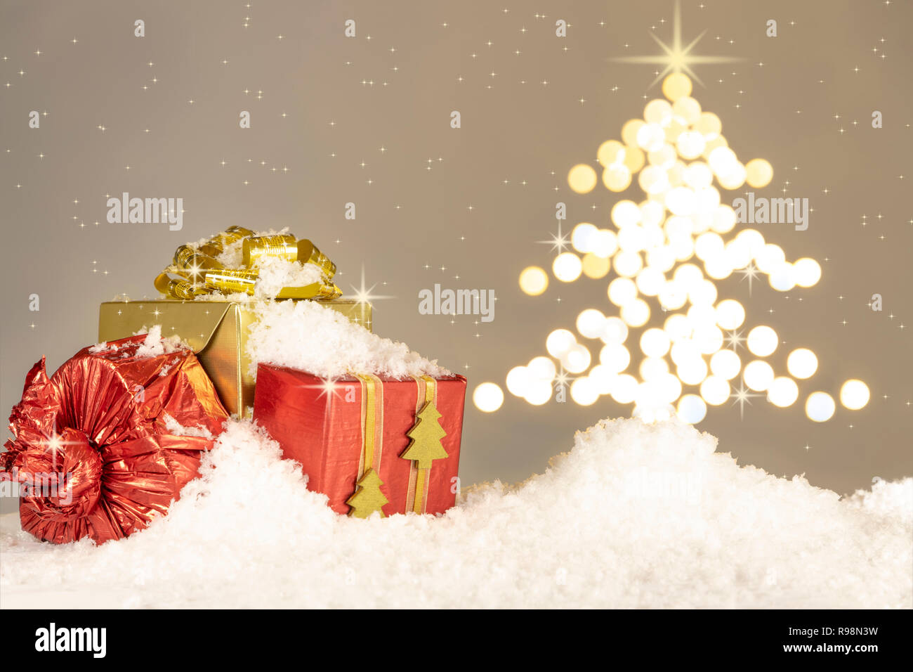 Christmas theme card with lights shaped tree and snow Stock Photo