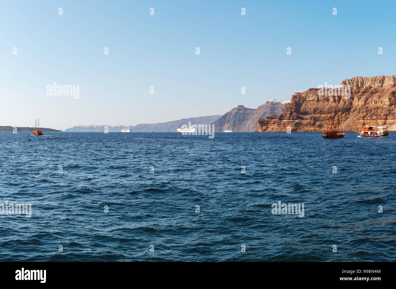 Cliffs of Santorini island, view from sea port Stock Photo