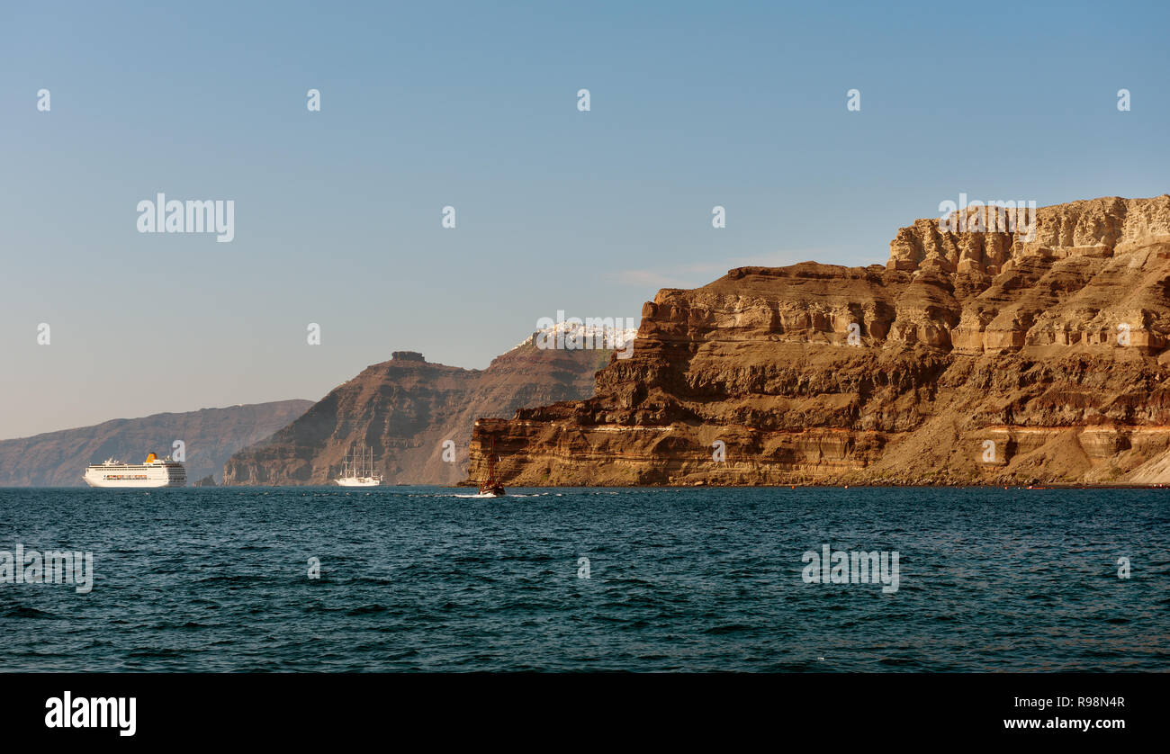 Cliffs of Santorini island, view from sea port Stock Photo