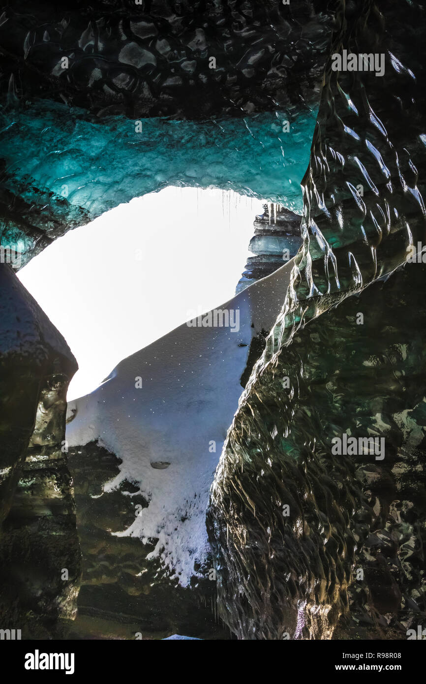 The melted sides of a vertical shaft of a moulin, aka glacier mill, the
