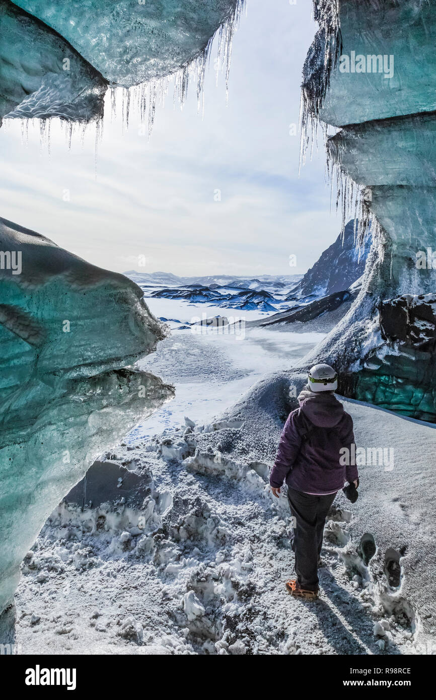 Karen Rentz on an Ice cave tour to a lobe of Mýrdalsjökull Glacier, which sits atop Katla Volcano, in winter in Iceland Stock Photo