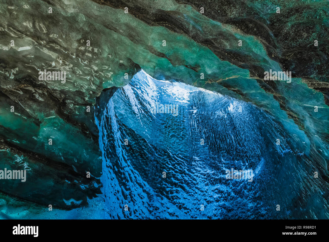The melted vertical shaft of a moulin, aka glacier mill, the dramatic