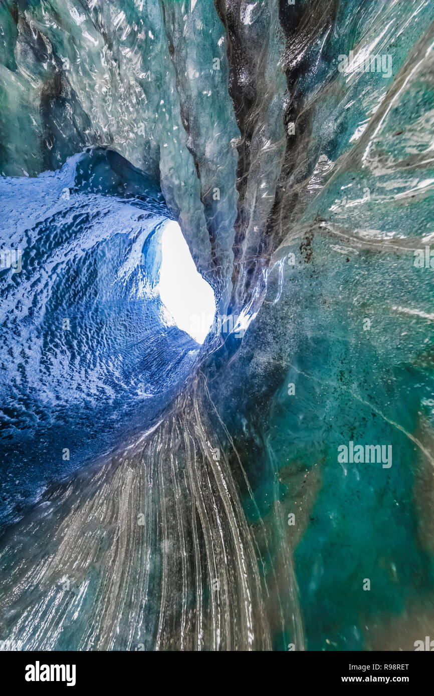 The melted vertical shaft of a moulin, aka glacier mill, the dramatic