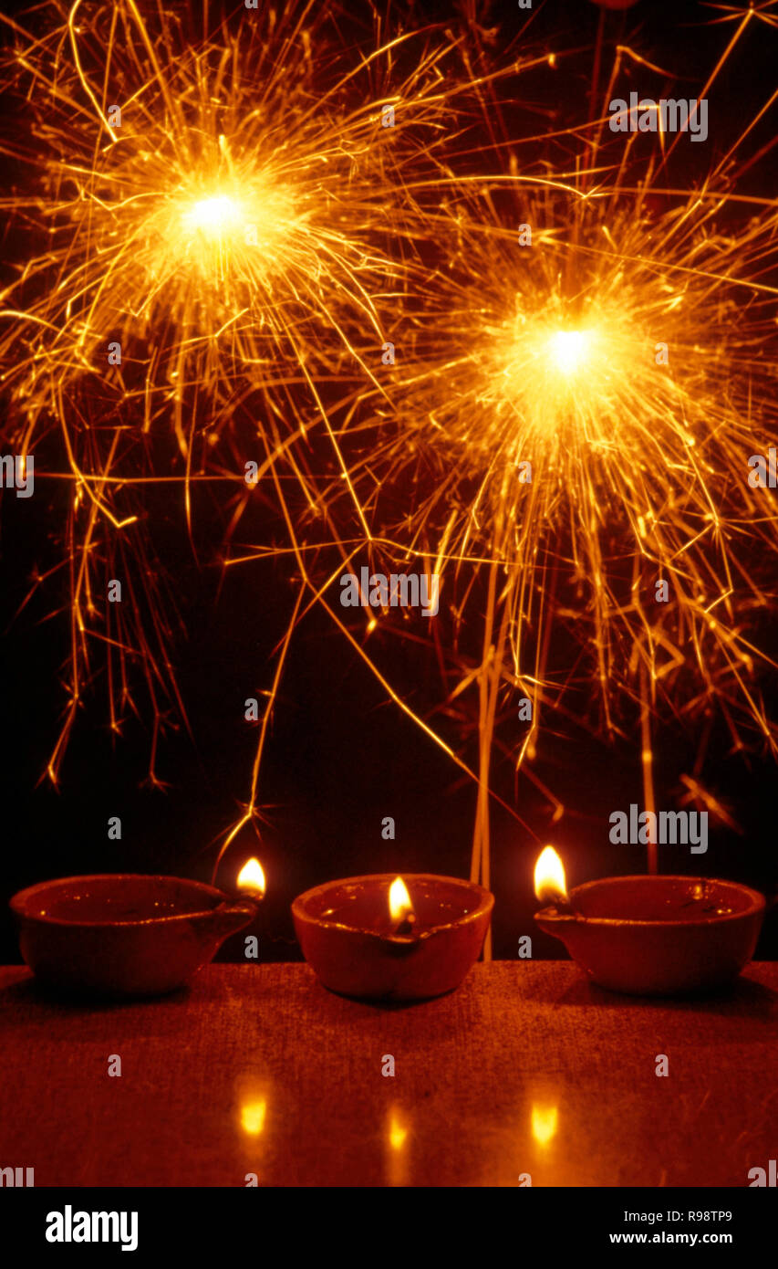 Diwali Festival fireworks and diyas Stock Photo