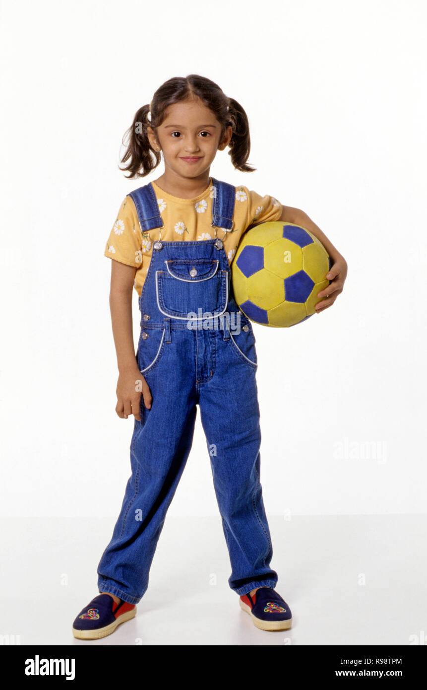 Young girl standing with ball - MR#235 Stock Photo