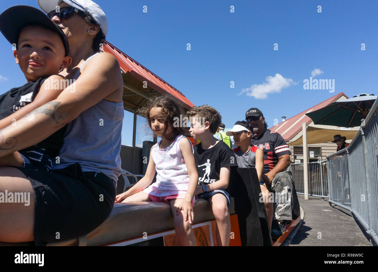 TAURANGA NEW ZEALAND - DECEMBER 16,2018; Model railway enthusiast engineers prepare vintage miniature train giving rides. Stock Photo