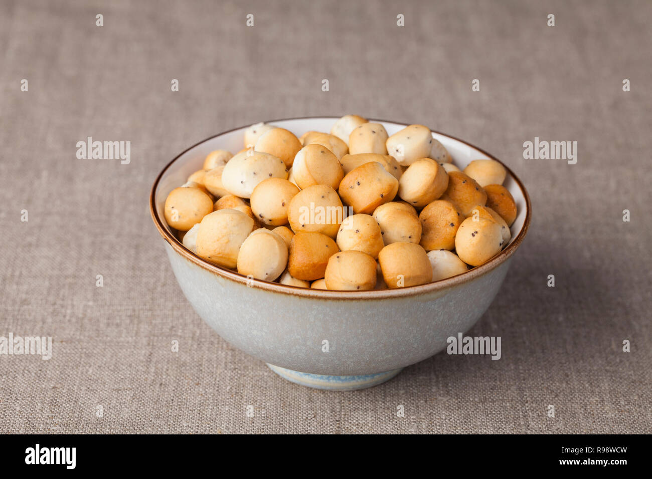 Kūčiukai (also šližikai) is a traditional Lithuanian dish served on Kūčios, the traditional Christmas Eve dinner in Lithuania. Sweet pastries made fro Stock Photo