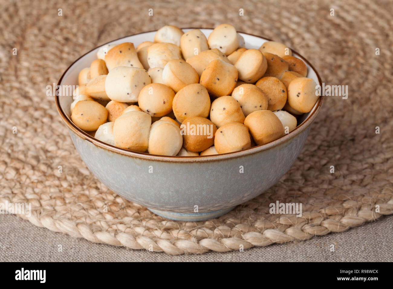 Kūčiukai (also šližikai) is a traditional Lithuanian dish served on Kūčios, the traditional Christmas Eve dinner in Lithuania. Sweet pastries made fro Stock Photo