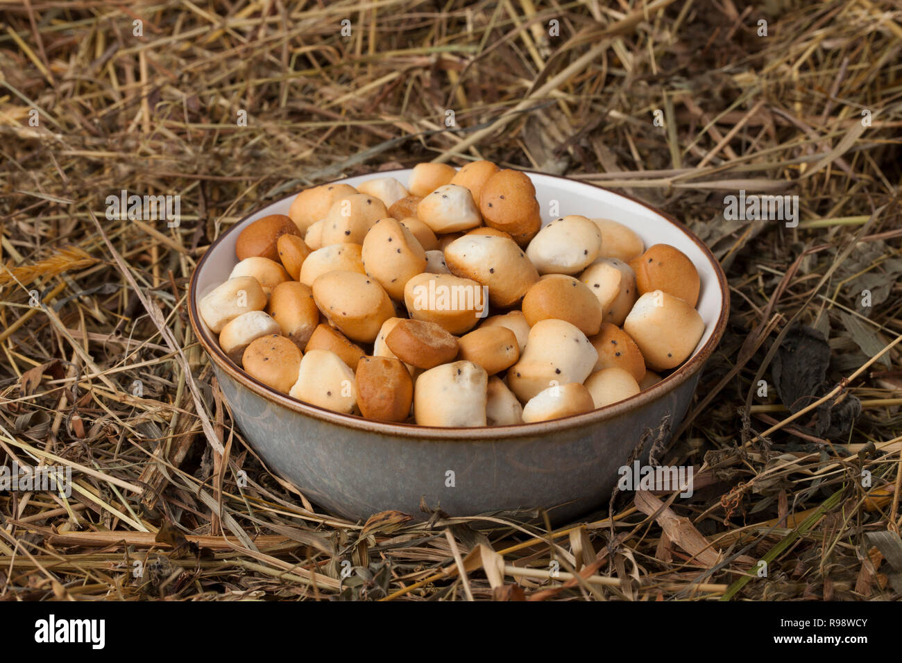 Kūčiukai (also šližikai) is a traditional Lithuanian dish served on Kūčios, the traditional Christmas Eve dinner in Lithuania. Sweet pastries made fro Stock Photo