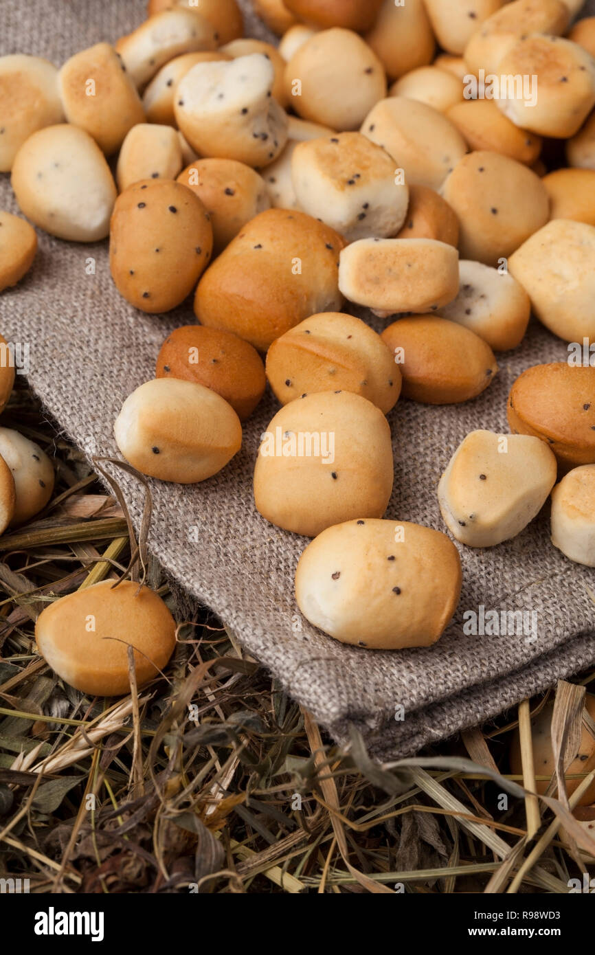 Kūčiukai (also šližikai) is a traditional Lithuanian dish served on Kūčios, the traditional Christmas Eve dinner in Lithuania. Sweet pastries made fro Stock Photo