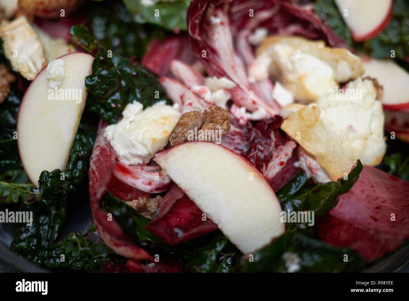 Beetroots leaves salad with hot goat cheese Stock Photo