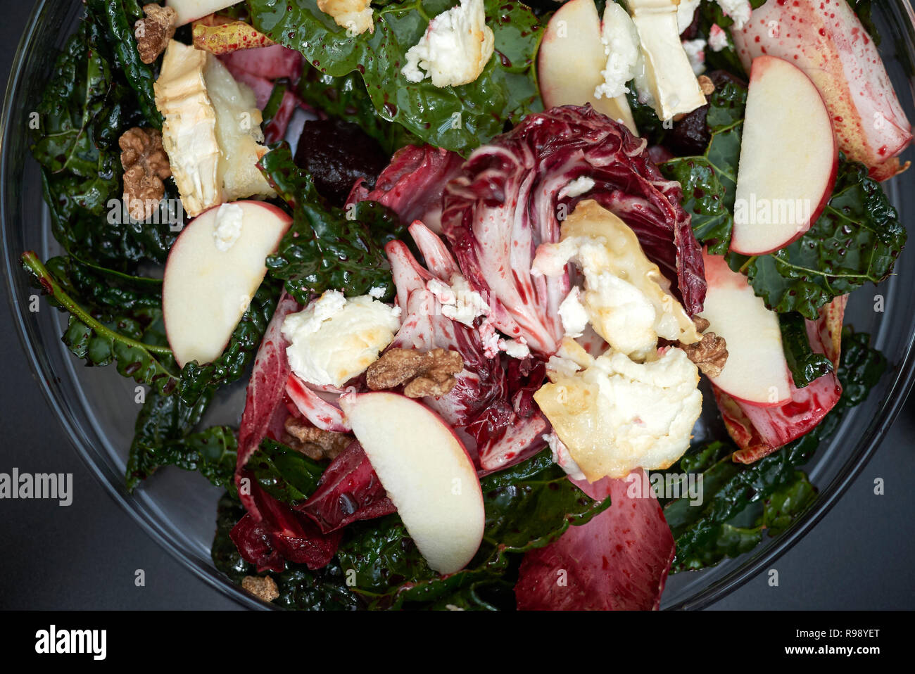 Beetroots leaves salad with hot goat cheese Stock Photo