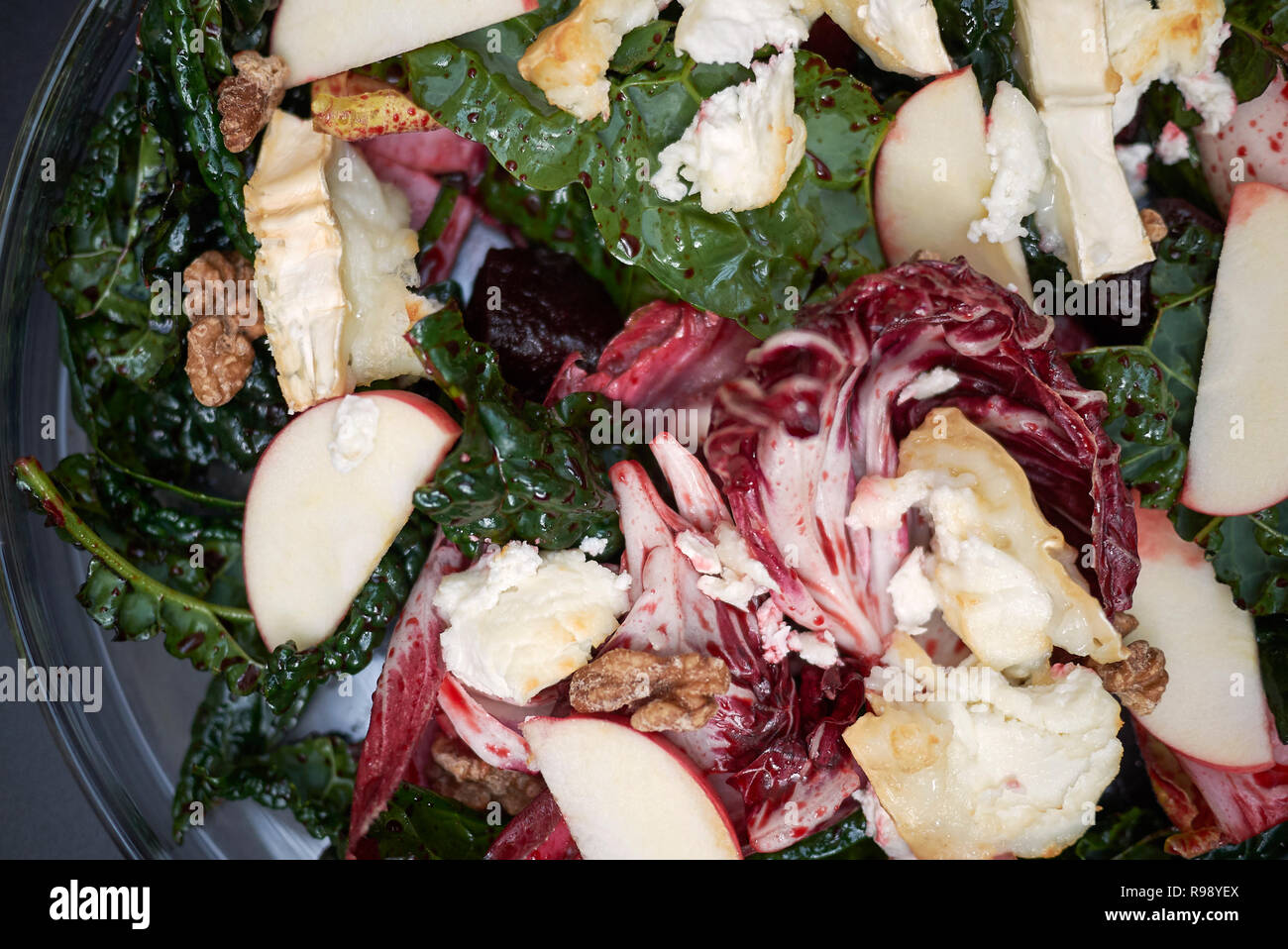 Beetroots leaves salad with hot goat cheese Stock Photo