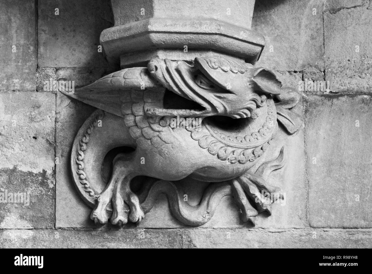 LONDON, ENGLAND - FEBRUARY 12, 2018. Gargoyle carved on one of the walls of Westminster Abbey, London, England, February 12, 2018. Stock Photo