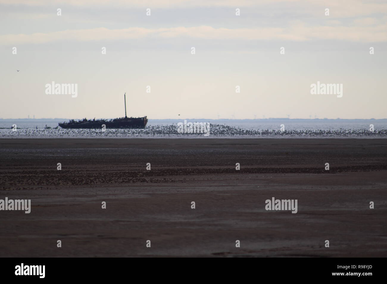 Friskney RAF bombing range ships on the beach Stock Photo