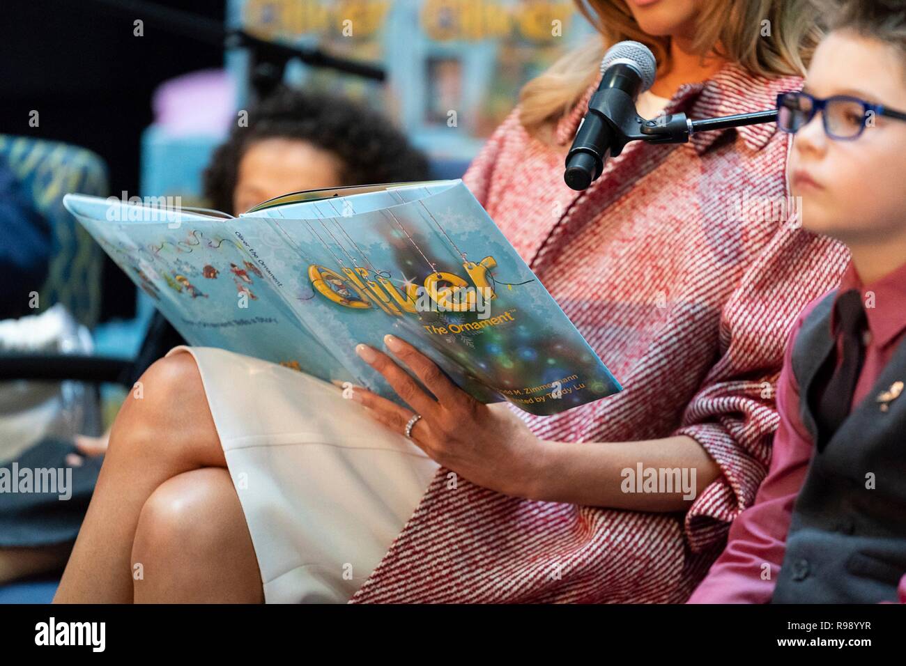 U.S. First Lady Melania Trump reads the children's book Oliver the