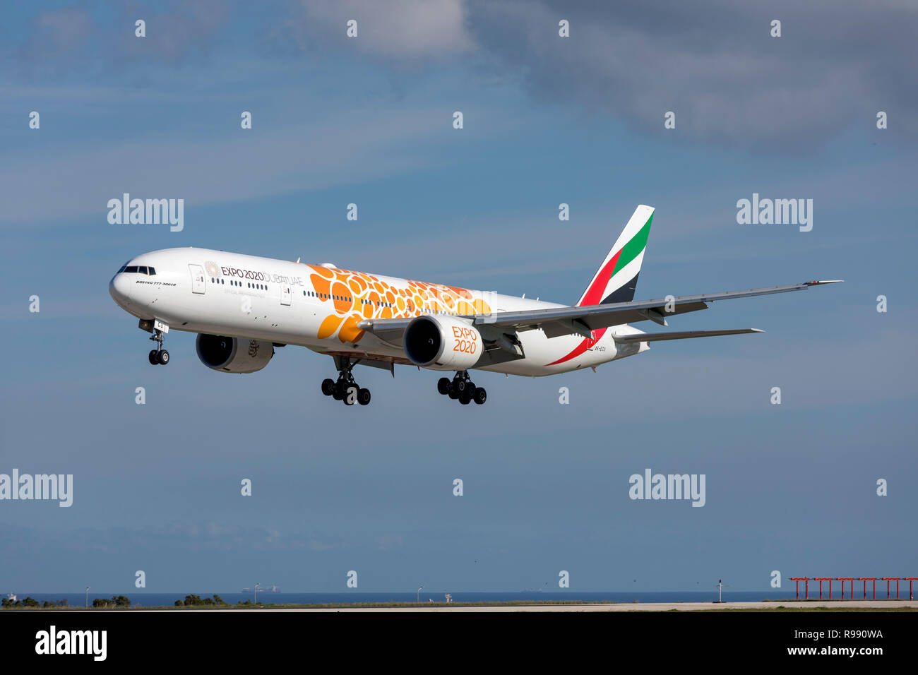 Emirates Boeing 777-31H/ER (REG: A6-ECU) with special Expo 2020 logo landing runway 31. Stock Photo