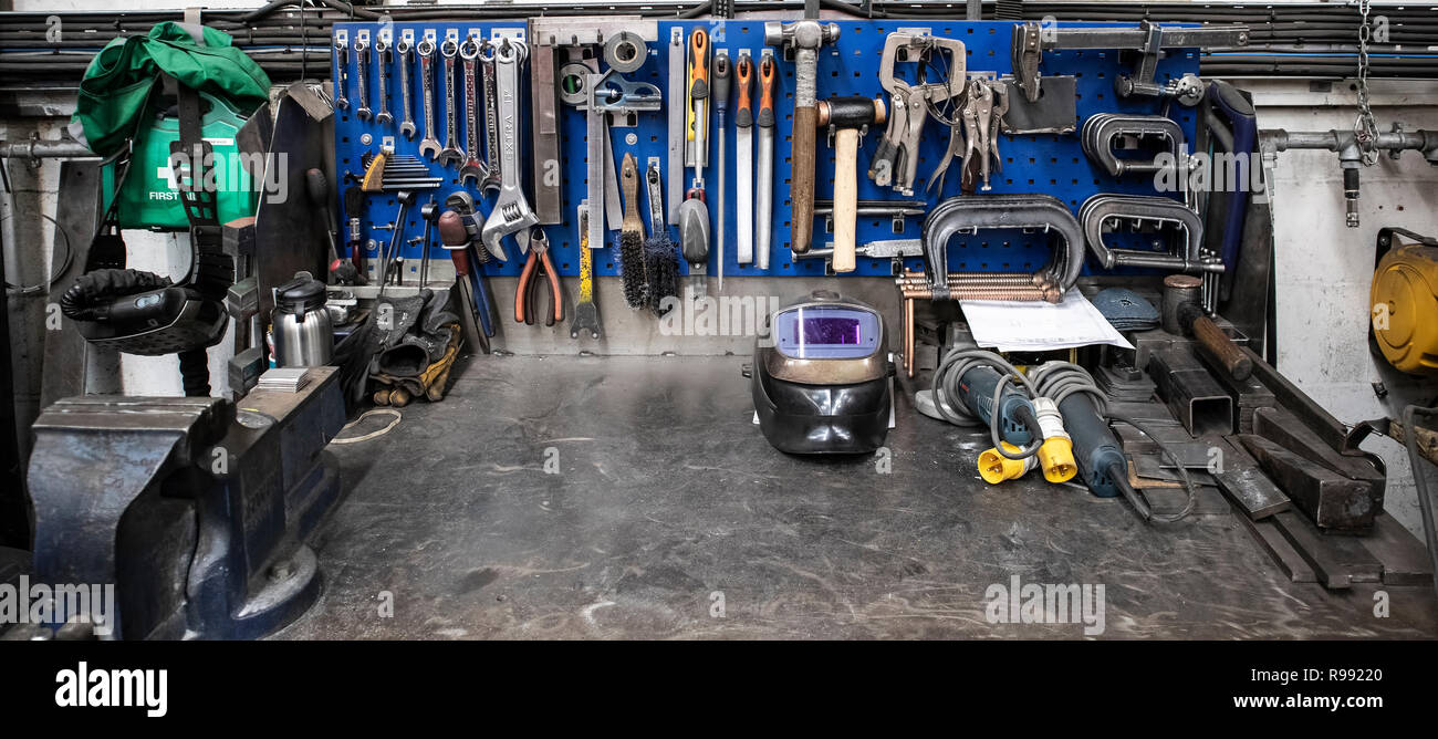 SWINDON, UK - DECEMBER 21, 2018: Welders Workbench with assortment of tools Stock Photo