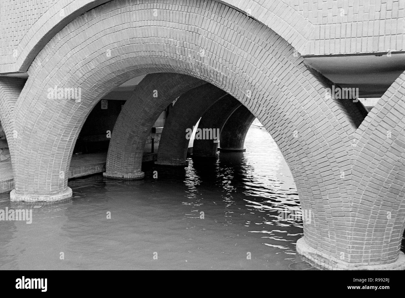 MONTERREY, NL/MEXICO - NOV 10, 2003: Arches form a mall bridge to cross the canal at Santa Lucia walk, near the Macroplaza Stock Photo