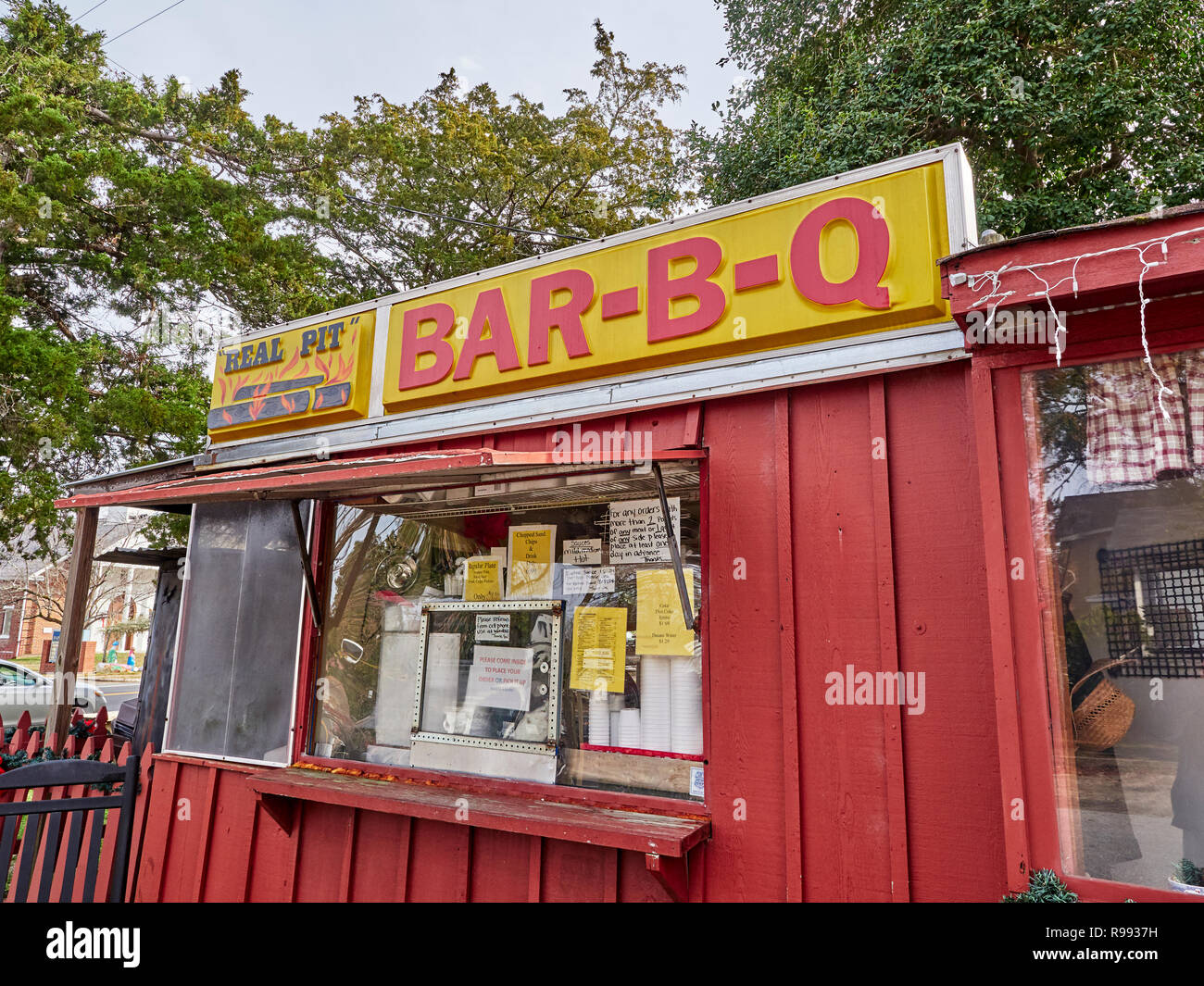 Front exterior entrance of a southern BBQ or barbecue restaurant in rural Warm Springs Georgia, USA. Stock Photo