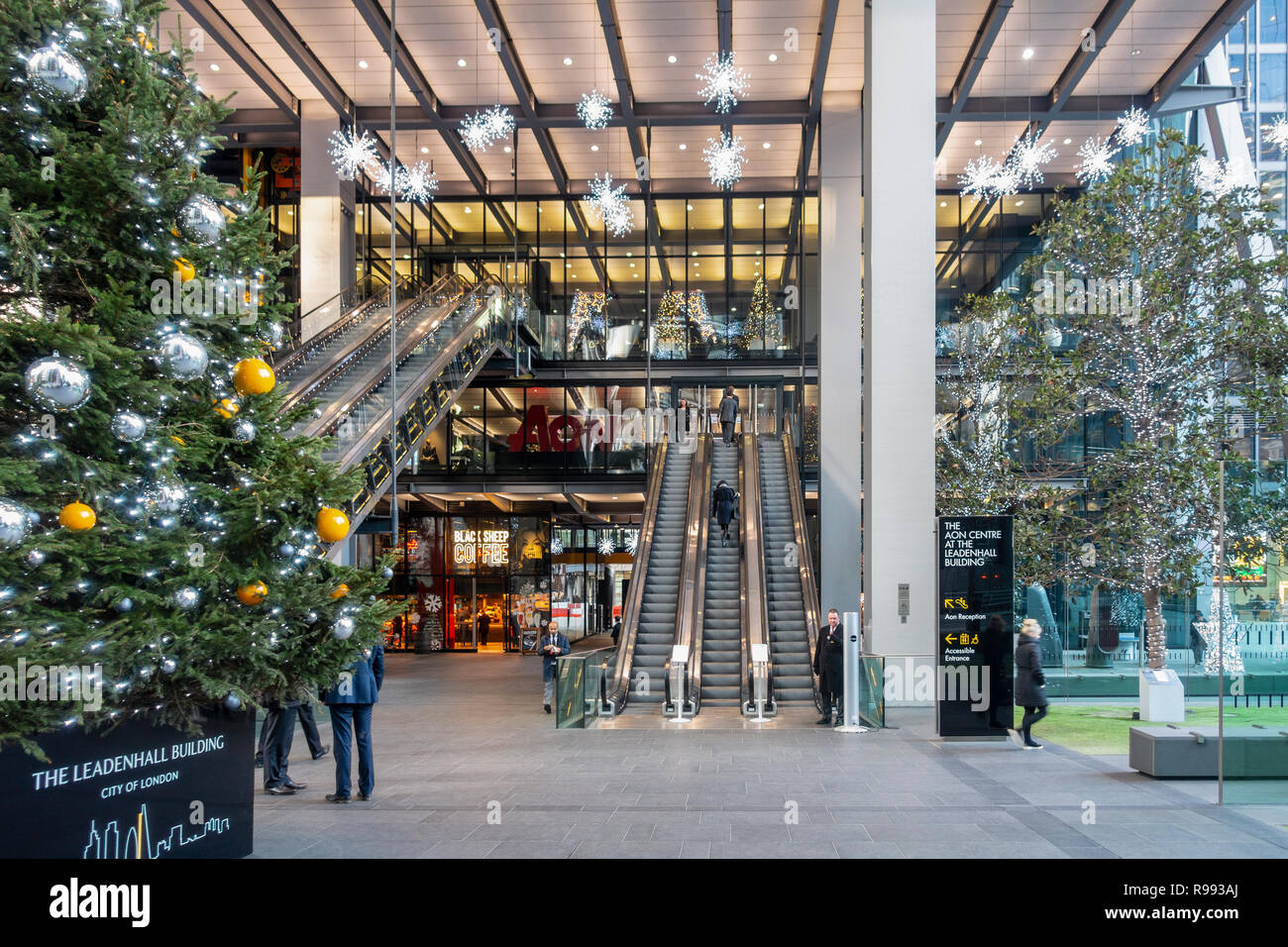 The atrium of the Leadenhall Building (2015) aka 122 Leadenhall Street and The Cheesegrater, with large decorated Christmas trees Stock Photo
