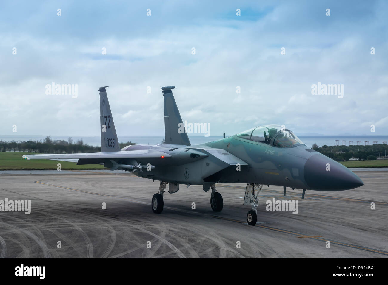 An F-15C Eagle waits to take off Dec. 11, 2018, at Kadena Air Base, Japan.  Both the 44th and 67th Fighter Squadrons at Kadena AB play a unique role in securing peace and stability in a free and open Indo-Pacific with their F-15C/D capabilities.  (U.S. Air Force photo by Airman 1st Class Matthew Seefeldt) Stock Photo