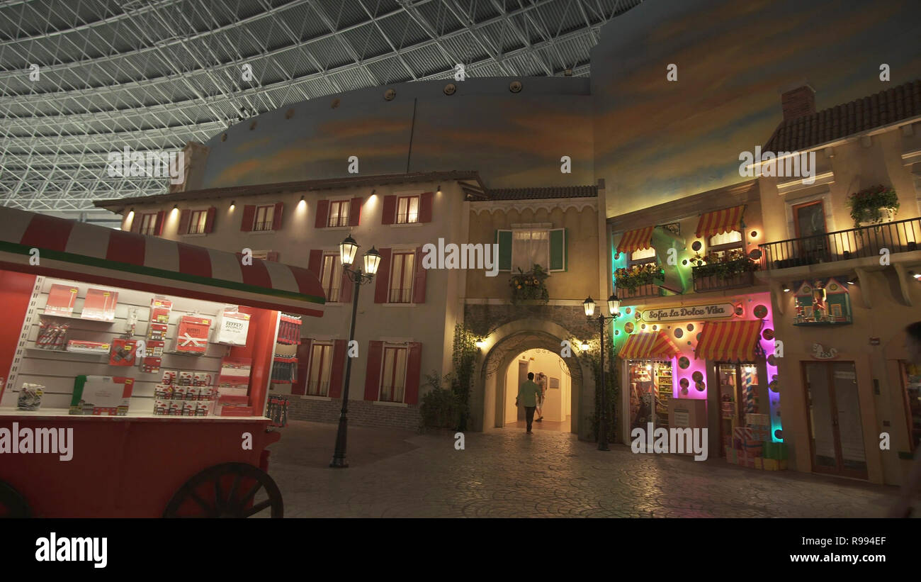 Italian street of cafes and shops in the theme park Ferrari World Abu Dhabi Stock Photo