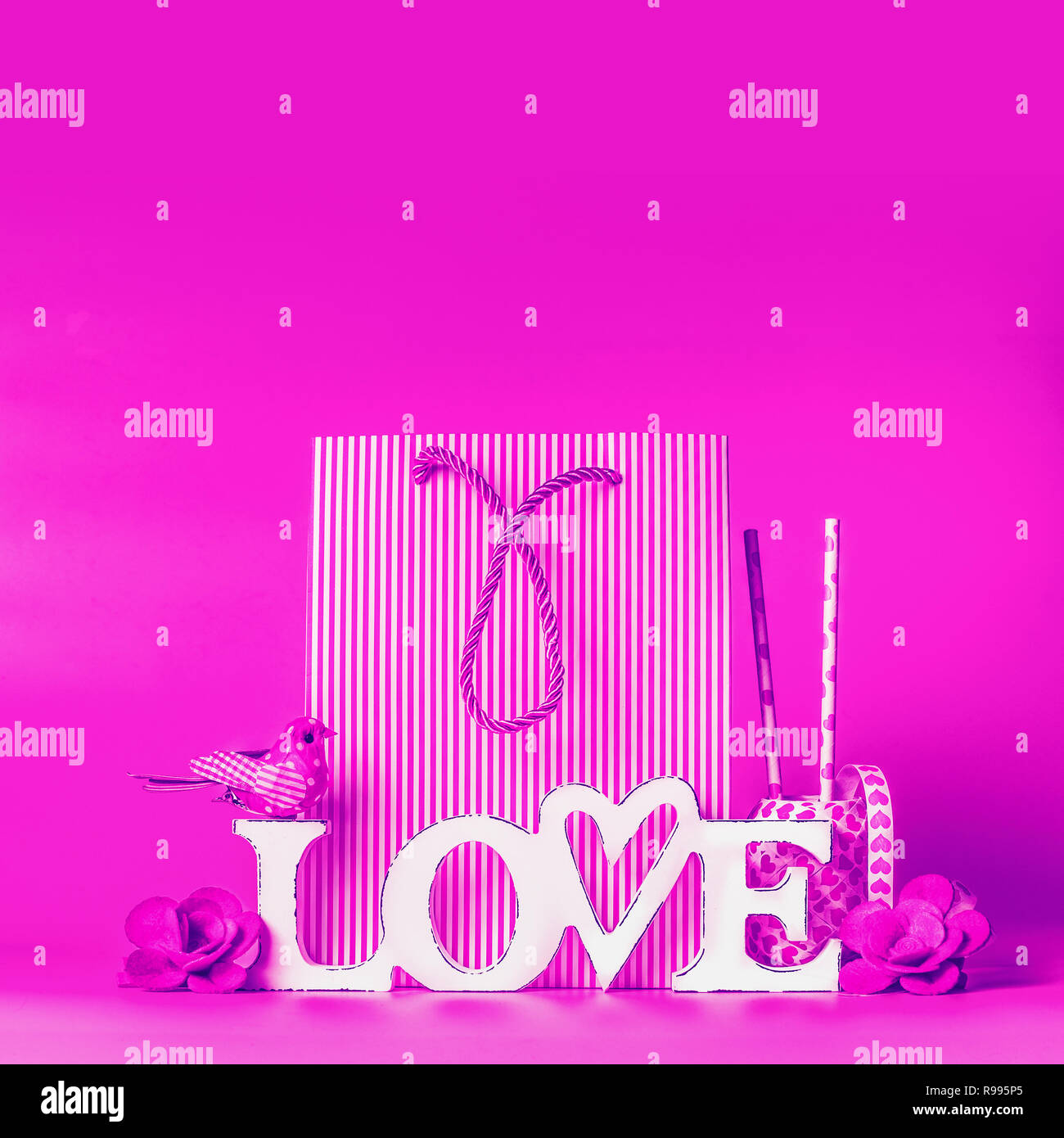 Creative love background concept in neon color. Word Love sign at shopping bag and decorations . Valentines day greeting and shopping sale, abstract l Stock Photo - Alamy Creative love background concept in neon color. Word Love sign at shopping bag and decorations . Valentines day greeting and shopping sale, abstract l Stock Photo - Alamy