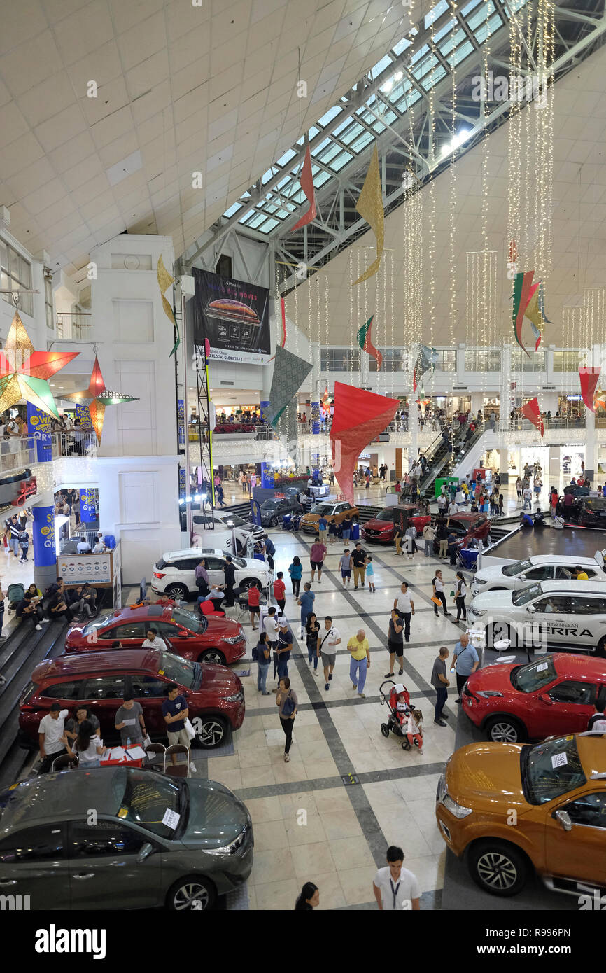 Cars for sale at the atrium of Greenbelt a shopping mall located at
